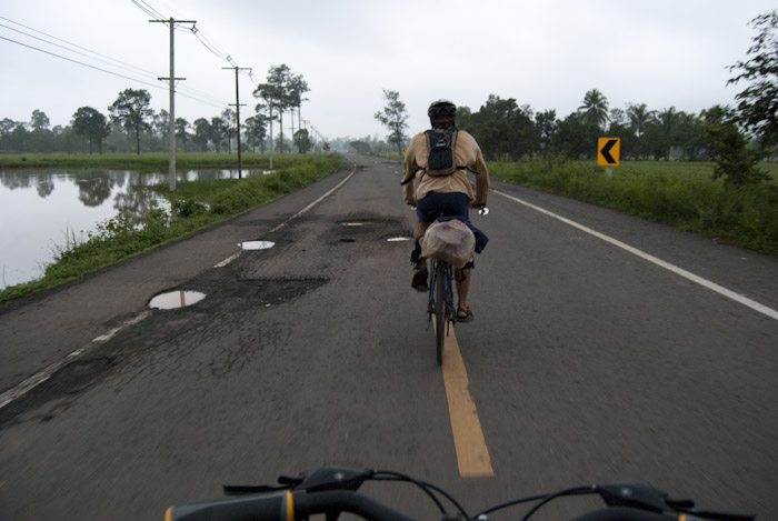 road with pot-holes